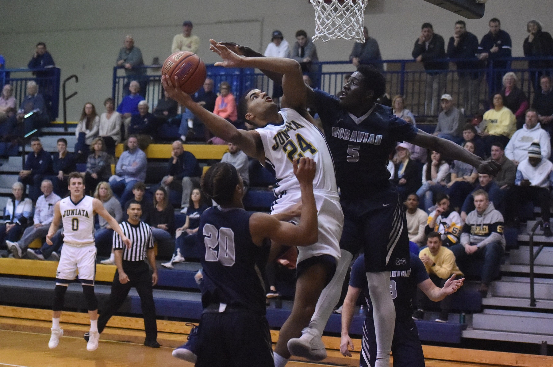 Marcus Lee scores two of his 17 points against Moravian.