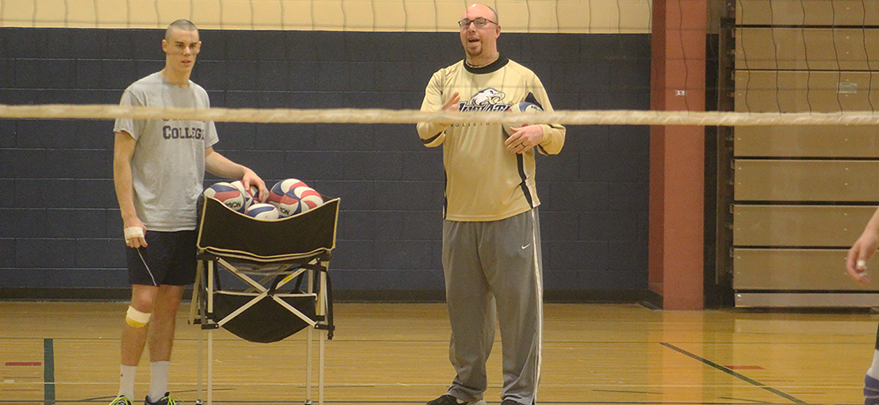 Glenn DeHaven (right) takes over as head coach of the Juniata Men's Volleyball program.
