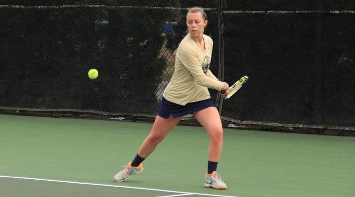 Tori Gray's win at sixth singles gave the Eagles a 5-4 victory over Catholic