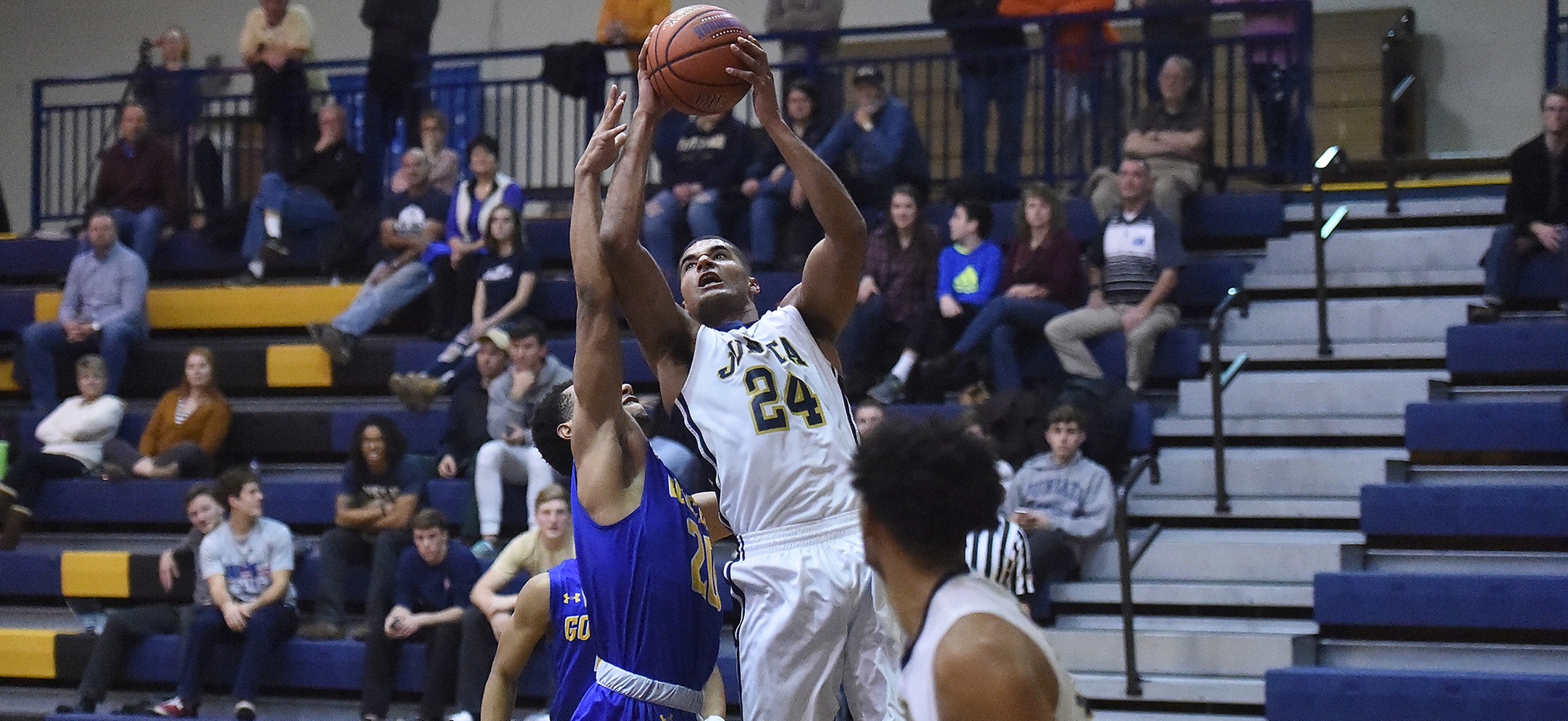 Marcus Lee goes up for two against Goucher.