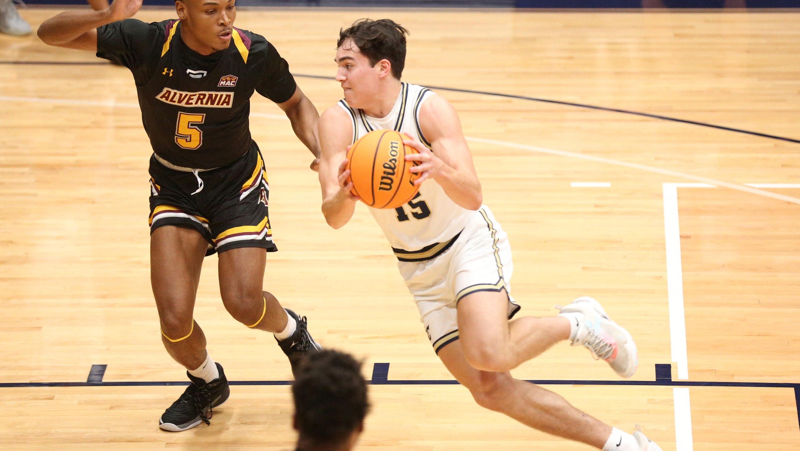 Golden Wolves Top Eagles in Home Opener