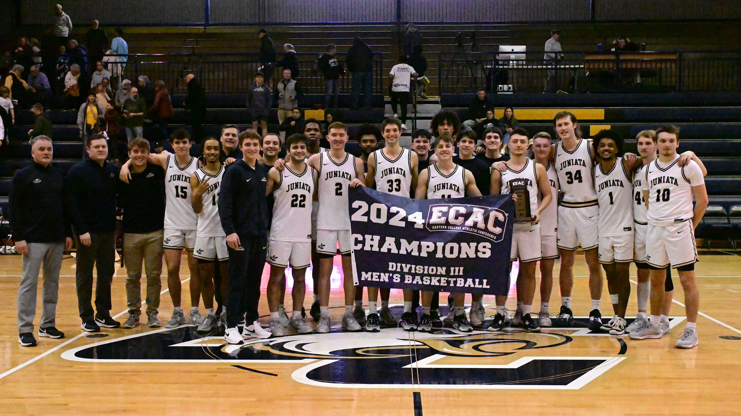 Men's Basketball Tops Golden Wolves, Crowned ECAC Champions