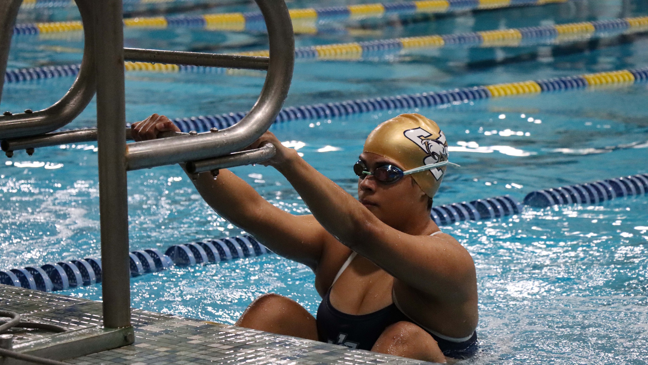 Royals Out Swim Eagles in First Home Meet